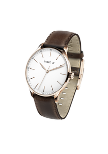Montre Luigi or rose vue de côté, bracelet brun et design sophistiqué
